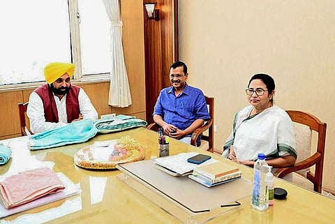 Representational Image: West Bengal Chief Minister Mamata Banerjee with Delhi Chief Minister Arvind Kejriwal and Punjab Chief Minister Bhagwant Mann, in Kolkata, May 23, 2023. (Photo | PTI)