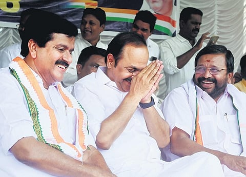 Leader of Opposition V D Satheesan shares a light moment with Congress leaders  V S Sivakumar and Sarath Chandraprasad on Tuesday during the inauguration of the UDF dharna against the state government