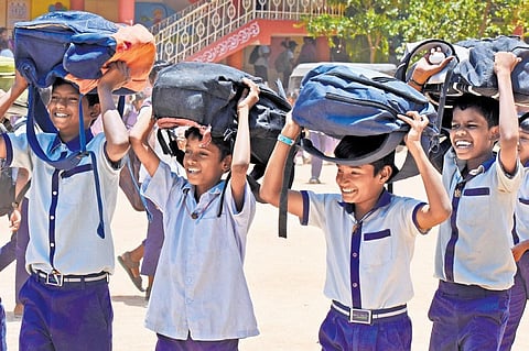 School students protect themselves from scorching heat. Image used for representational purpose (File Photo | Madhav K)