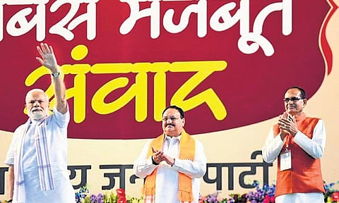 Prime Minister Narendra Modi (left) at a BJP event in Bhopal on Tuesday . (Photo| PTI)