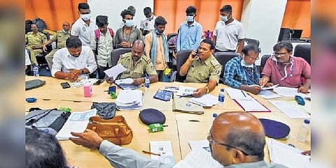 Authorities were busy with paperwork before handing over cheques to kin of train crash victims at AIIMS in Bhubaneswar on Tuesday (Photo |  Debadatta Mallick)