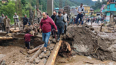 Former Himachal Pradesh chief minister Jai Ram Thakur inspects the flood-affected areas, in Mandi, Tuesday, July 11, 2023. (Photo|PTI)