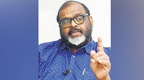 Transport Minister C P John