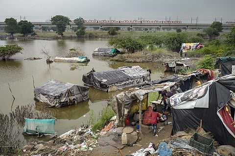 Houses submerged in the floodwaters of  Yamuna river near Nizamuddin Bridge, in New Delhi, Tuesday, July 18, 2023. (Photo|PTI)