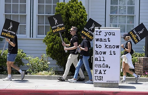 The actors strike comes more than two months after screenwriters began striking in their bid to get better pay and working conditions. (Photo | AP)