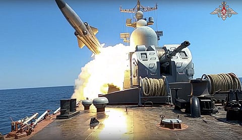 A warship of the Russian Black Sea Fleet fires a missile while taking part in naval drills in the Black Sea.  (Photo | AP)