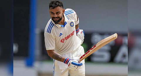 India's Virat Kohli celebrates after his century against West Indies on day two of tge second Test match at Queen's Park in Port of Spain, Trinidad and Tobago, Friday, July 21, 2023. (Photo | AP)