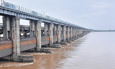 The floodwater level at the Sir Arthur Cotton Barrage receded after reduction in inflows from Telanagana, in Rajamahendravaram on Saturday | Express