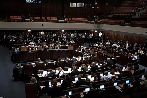 Israel's Prime Minister Benjamin Netanyahu and lawmakers attend a session of the Knesset, Israel's parliament, in Jerusalem, Monday, July 24, 2023. (Photo | AP)