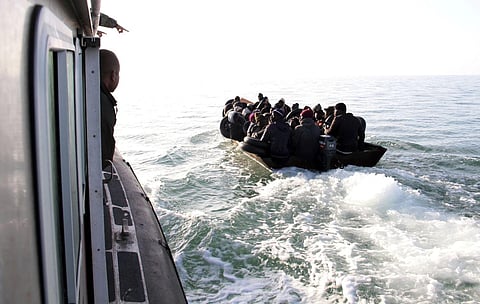 FILE - Migrants, mainly from sub-Saharan Africa, are stopped by Tunisian Maritime National Guard at sea during an attempt to get to Italy, near the coast of Sfax, Tunisia, April 18, 2023. (Photo | AP)