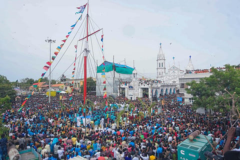 Thousands participating in the flag hoisting ceremony of Our Lady of Snows Basilica festival at Thoothukudi. (Photo | V Karthikalagu, EPS)