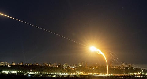 Ukrainian air defense intercepts a Shahed drone mid-air in the third Russia aerial attack on the capital in the last 24 hours in Kyiv, Ukraine. (Photo | AP)