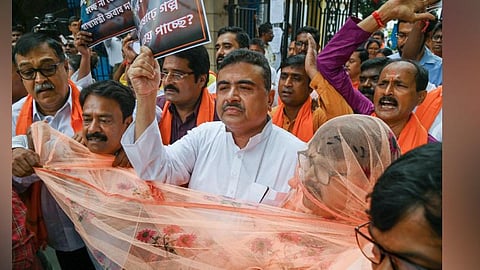Leader of Opposition in West Bengal Assembly Suvendu Adhikari with other BJP MLAs stage a walkout from the assembly over rising dengue cases. 