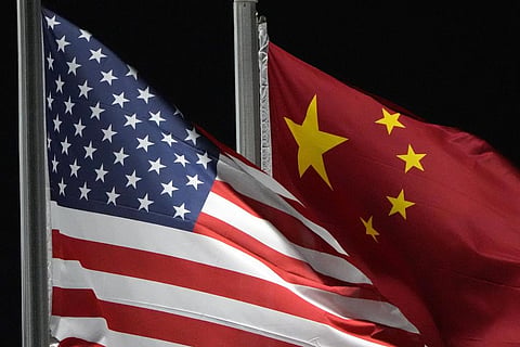 The American and Chinese flags wave at Genting Snow Park ahead of the 2022 Winter Olympics, in Zhangjiakou, China, on Feb. 2, 2022. (File photo | AP)