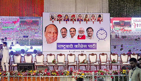 A hoarding bearing a photo of Nationalist Congress Party (NCP) chief Sharad Pawar put up at the venue of the meeting of Ajit Pawar-led NCP, in Mumbai, Wednesday, July 5, 2023. (Photo | PTI)