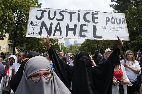People protesting in France after the a 17-year-old was shot dead by the police. (Photo | AP)