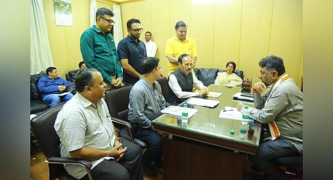 Respresentatives of Bruhat Bangalore Hotels Association meet Deputy Chief Minister D K Shivakumar on Saturday. (Photo | Express)