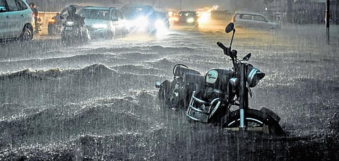 Big waves crash on the flooded Cuttack-Puri Road as heavy rains lashed Bhubaneswar, on Monday evening | Debadattta Mallick