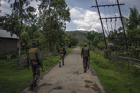FILE - Indian army soldiers patrol a deserted village in Manipur, Tuesday, June 20, 2023. (Photo | AP)