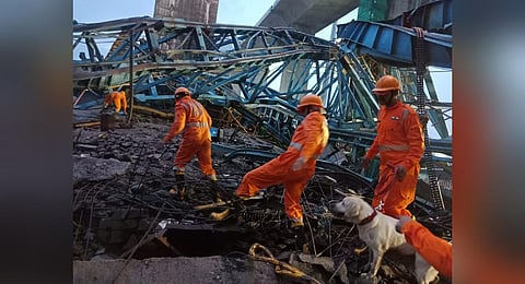 NDRF personnel during a search and rescue operation following a crane accident along the under-construction Samruddhi Expressway, in New Thane, Aug 1, 2023. (Photo | PTI)