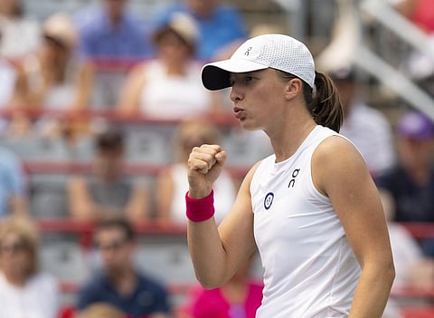 Iga Swiatek, of Poland, reacts during her match against Karolina Pliskova, of Czech Republic, during the National Bank Open tennis tournament in Montreal (Photo | AP)