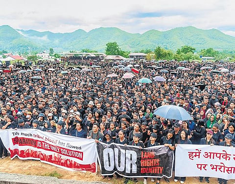 Members of the Indigenous Tribal Leaders’ Forum at a protest rally  over the parading of women naked, in Churachandpur district of Manipur; and (inset) main culprit Huirem Herodas Meitei (File pic)