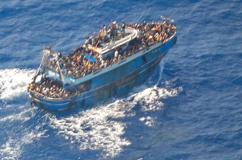 Hundreds of migrants died or went missing after a fishing trawler sank in international waters near coast of Greece. (Photo | AP)
