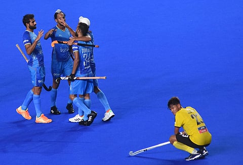 Skipper Harmanpreet Singh scored a brace as defending champions India beat Korea 3-1.