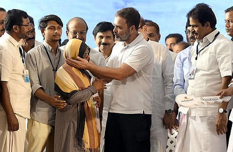 Rahul Gandhi with a beneficiary of a housing project in Kalpetta, Wayanad. (Photo | E Gokul)