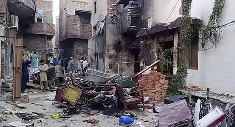 Damaged furniture outside a burned church in a Christian neighborhood following an angry Muslim mob attack in Jaranwala near Faisalabad in Pakistan (File photo | AP)
