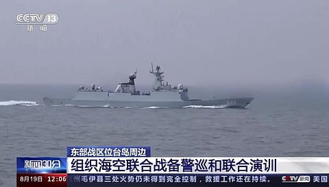 In this image taken from video footage run by China's CCTV, a Chinese warship conducts drills in an area around Taiwan on Saturday, Aug 19. 2023. (Photo | AP)