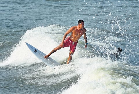 Surfers during an evening practice session at World Surfing leaugue  in Mahabalipuram | file picture