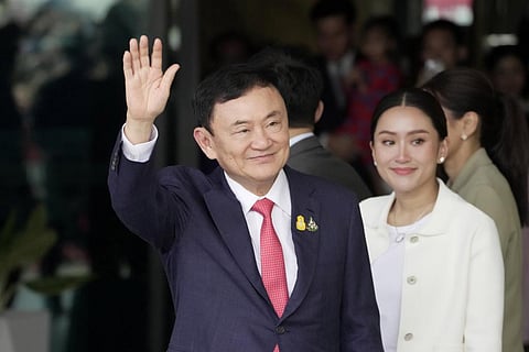 Thailand's former Prime Minister Thaksin Shinawatra (L), with his daughter Paetongtarn Shinawatra at the Don Muang airport in Bangkok, Aug. 22, 2023. (Photo | AP)