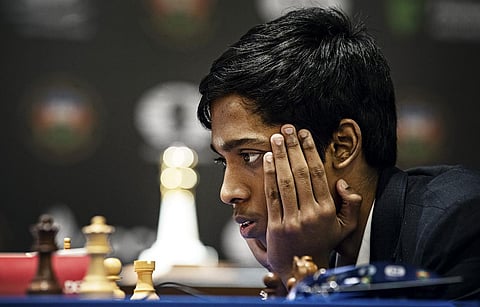 Indian Grandmaster R Praggnanandhaa during the first game of the Chess World Cup 2023 final against Norway's Grandmaster and World No. 1 player Magnus Carlsen, in Baku. (Photo | PTI)