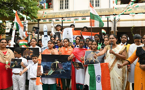 School children celebrate the soft landing of the rover part of  Chandrayaan-3 on the lunar surface on Wednesday in Hyderabad | Vinay Madapu