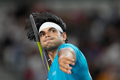 Neeraj Chopra, of India, makes an attempt in the Men's javelin throw final during the World Athletics Championships in Budapest, Hungary, Sunday, Aug. 27, 2023. (AP Photo/Matthias Schrader)