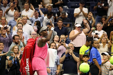 Venus Williams waves as she departs after losing to Greet Minnen during the first round of the U.S. Open tennis championships. (Photo | AP)