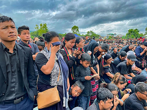 People from the Zo-Kuki community during a prayer meeting in remembrance of tribals killed in the ongoing ethnic violence in Manipur, in Churachandpur, on August 3, 2023.  (Photo | PTI)