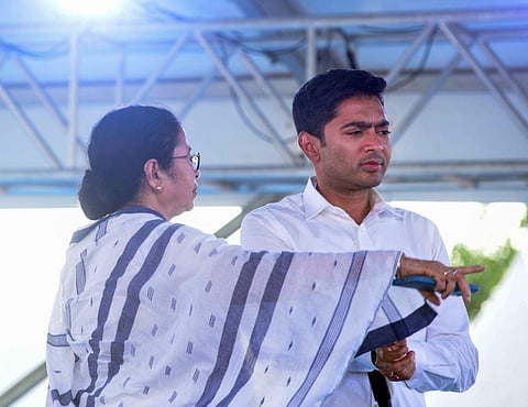 TMC General Secretary Abhishek Banerjee with West Bengal Chief Minister Mamata Banerjee. (Photo | PTI)