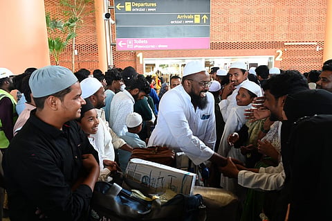 Passengers coming out of Saudi Airlines flight SV 866 - the first international flight to land at Terminal 2 of KIA Airport in Bengaluru. (Nagaraja Gadekal, EPS)
