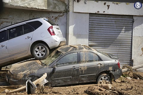 In this image provided by the Libyan government, cars sit, one stacked on top of the other, after being carried by floodwaters  in Derna, Sept 11, 2023. (Photo | AP)