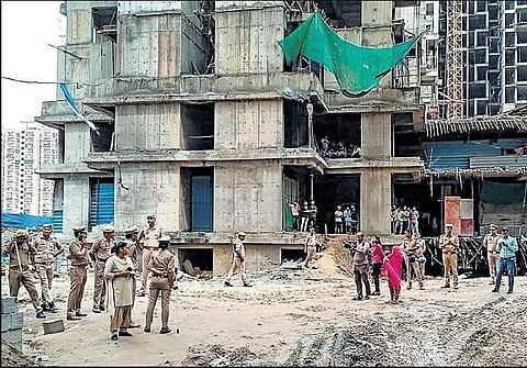 The lift had nine workers in it when it fell from the 14th floor of an under-construction tower at an Amrapali Dream Valley project site in Noida | Express