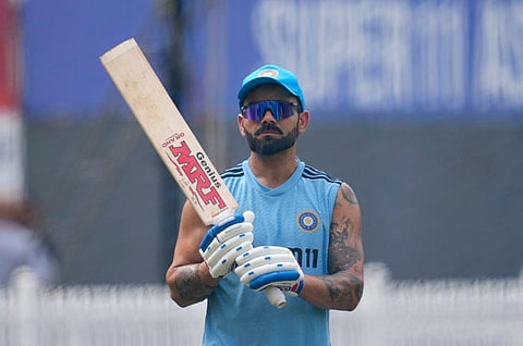 Virat Kohli holds his bat before the Asia Cup final cricket match between India and Sri Lanka in Colombo, Sri Lanka, Sunday, Sep. 17, 2023. (Photo | AP)