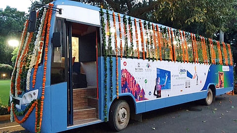 A 'Skills on Wheels' bus is decorated to be flagged off by Lok Sabha Speaker Om Birla and Union Education Minister Dharmendra Pradhan, in New Delhi on Sunday. (Photo | ANI)