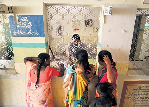 Women gather at the pharmacy to collect the prescribed medicines at the CHC at Eturnagaram in Mulugu district  | Sri Loganathan Velmurugan