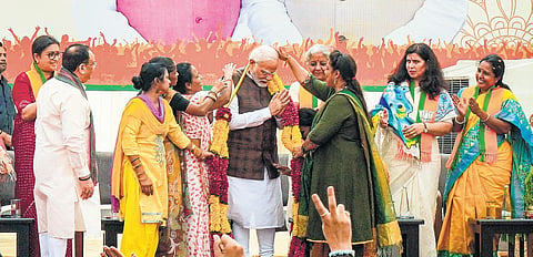 PM Narendra Modi being felicitated during the ‘Nari Shakti Vandan-Abhinandan Karyakram’ at BJP headquarters on Friday | PTI
