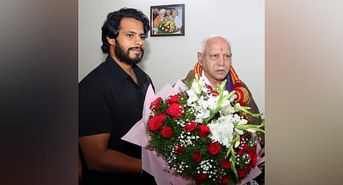 JDS youth wing leader Nikhil Kumaraswamy greets former CM BS Yeddiyurappa in Bengaluru on Sunday. 
