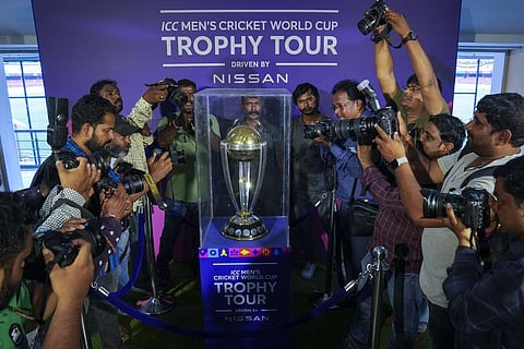FILE - Photographers take pictures during a trophy tour of the upcoming ICC Men's Cricket World Cup at the Rajiv Gandhi International Cricket Stadium in Hyderabad, Sept. 21, 2023. (Photo | AP)