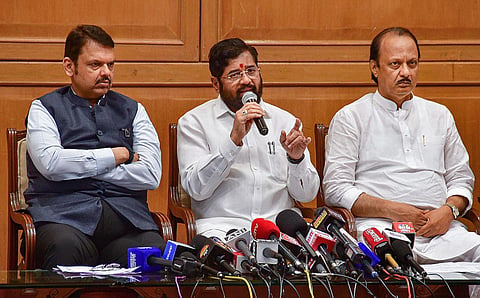 Maharashtra Chief Minister Eknath Shinde (C) with Deputy Chief Ministers Devendra Fadnavis (L) and Ajit Pawar (R) after a meeting on the issue of 'Maratha' reservation. (PTI)