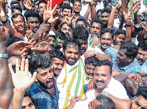 Chandy Oommen being cheered on by a euphoric group of UDF followers as he emerges from the counting station in Kottayam on Friday | Vishnu Prathap